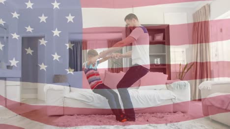 Animation-of-flag-of-usa-waving-happy-caucasian-father-and-son-playing-in-living-room
