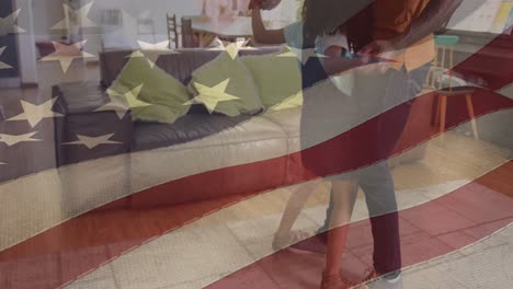 Animation-of-flag-of-usa-waving-over-african-american-father-dancing-with-daughter
