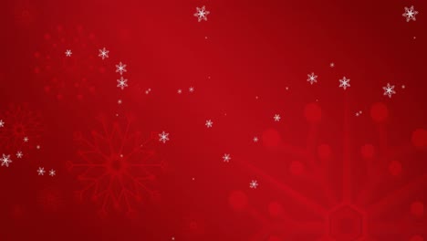 Animation-of-snowflakes-falling-on-red-background
