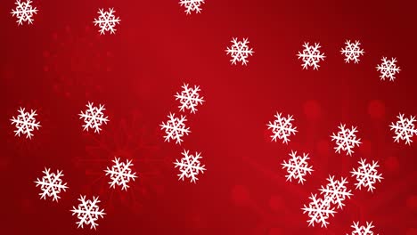 Animation-of-snowflakes-falling-on-red-background