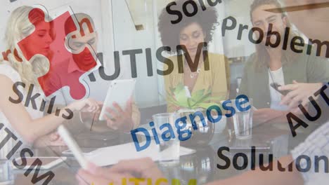Animation-of-colourful-puzzle-pieces-and-autism-text-over-work-colleagues-using-tablets