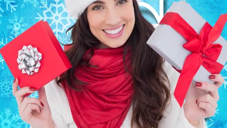 Animation-of-happy-caucasian-woman-keeping-presents-wearing-santa-hat-over-blue-background