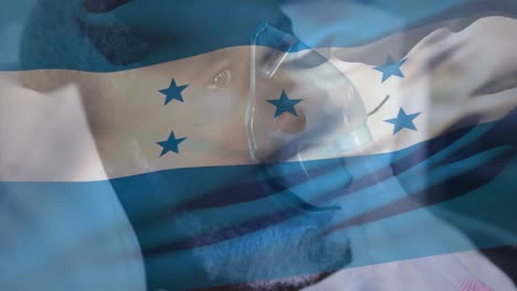 Animación-De-La-Bandera-De-Honduras-Ondeando-Sobre-Un-Paciente-Bajo-Ventilador.