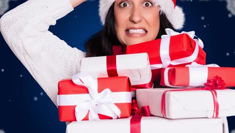 Animation-of-surprised-caucasian-woman-keeping-presents-wearing-santa-clothes-over-blue-background