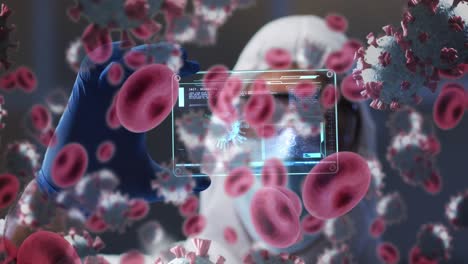 Animation-Von-Covid-Zellen-über-Einem-Männlichen-Arzt,-Der-Den-Bildschirm-Mit-Medizinischer-Datenverarbeitung-Hält