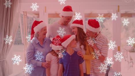 Animation-of-snow-falling-over-smiling-caucasian-family-with-santa-hats-embracing