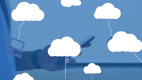 Animation-of-digital-clouds-with-icons-over-man-using-smartphone