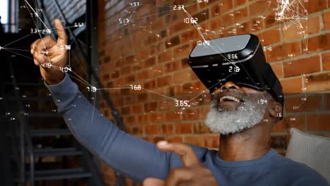 Animation-of-network-of-connections-and-data-processing-over-senior-man-in-vr-headset