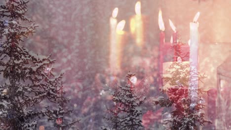 Animation-of-winter-landscape-over-christmas-candles