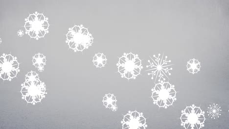 Animation-of-white-snowflakes-falling-on-grey-background