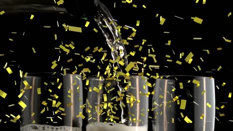 Animation-of-gold-confetti-falling-over-champagne-glasses-on-black-background