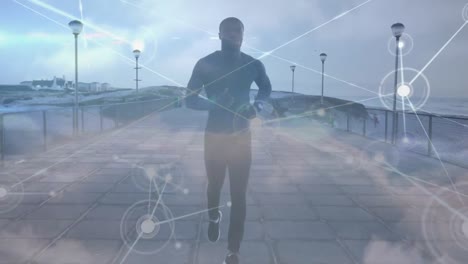 Animation-of-network-of-connections-over-fit-african-american-man-jogging-on-pier