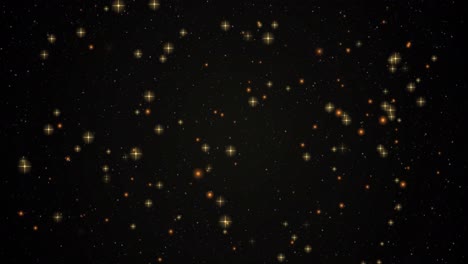 Animation-of-warm-glowing-yellow-stars-and-orange-spots-on-black-background