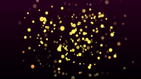 Animation-of-warm-glowing-yellow-spots-on-black-background