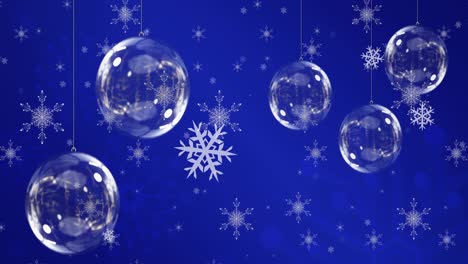 Animation-of-christmas-balls-over-snowflakes-on-blue-background