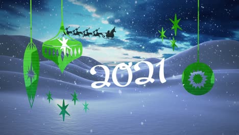 Animation-of-2021-text-with-baubles-over-santa-claus-in-sleigh-with-reindeer-over-winter-landscape