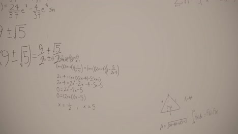 Animation-of-mathematical-equations-over-white-background