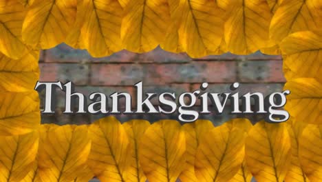 Thanksgiving-text-and-frame-of-autumn-leaves-against-brick-wall-background