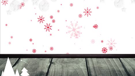 Animation-of-snow-falling-over-christmas-trees-and-decorations-on-white-background