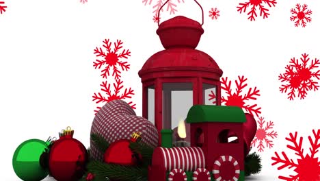 Animation-Von-Weihnachtsdekorationen-Mit-Kugeln-Und-Laterne-über-Schnee,-Der-Auf-Weißen-Hintergrund-Fällt