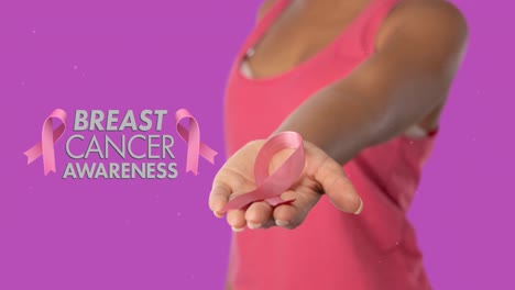 Animation-of-breast-cancer-awarness-text-mixed-race-woman-holding-pink-ribbon