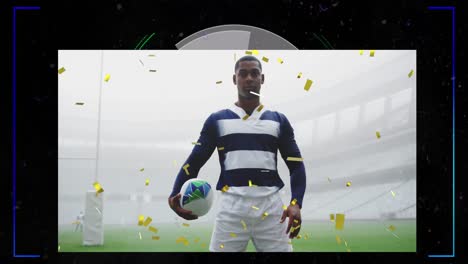 Animation-of-gold-confetti-over-african-american-rugby-player-holding-ball-in-sports-stadium
