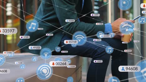 Animation-of-network-of-connection-with-icons-over-man-using-smartphone