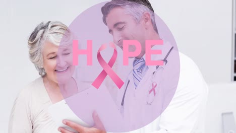 Animation-of-hope-with-pink-ribbon-over-caucasian-senior-woman-and-male-doctor