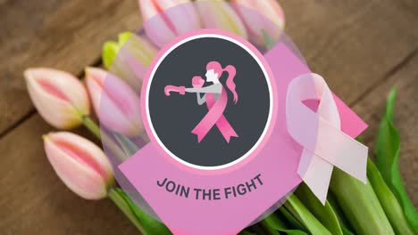 Animation-of-join-the-fight-and-fighting-woman-icon-over-tulips-on-table