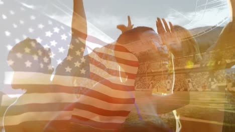 Animation-Der-Schwenkenden-Flagge-Der-USA-über-Einer-Gruppe-Von-Freunden,-Die-Sich-Am-Strand-Und-Im-Stadion-Amüsieren