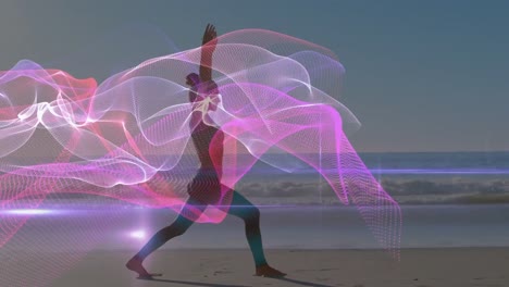 Animation-of-colorful-shapes-over-caucasian-woman-praciticing-yoga-on-beach