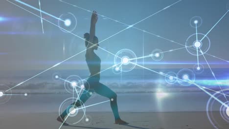 Animation-Von-Netzwerken-Von-Verbindungen-über-Eine-Kaukasische-Frau,-Die-Am-Strand-Yoga-Praktiziert