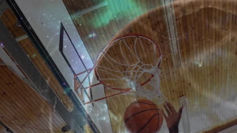 Animation-of-networks-of-connections-with-globe-over-african-american-male-basketball-player-at-gym