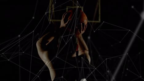 Animation-of-networks-of-connections-over-caucasian-male-basketball-player-at-gym