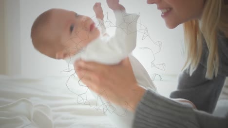 Animation-of-moving-network-of-connections-over-caucasian-mother-holding-baby