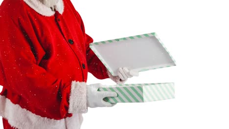Animation-of-snow-falling-over-santa-claus-holding-gift