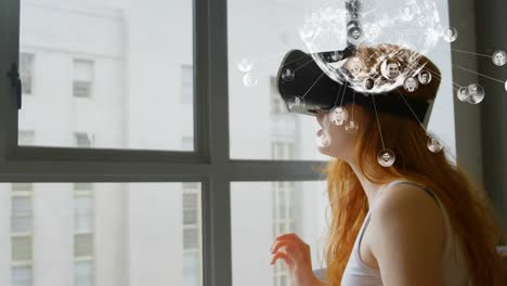 Animation-of-globe-with-network-of-connections-and-people's-photographs-over-woman-using-vr-headset