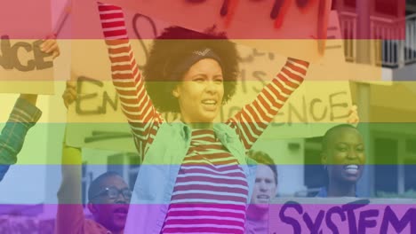 Animation-of-rainbow-over-diverse-protesters-with-banners