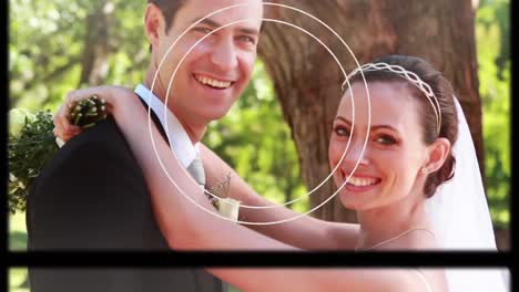 Animation-of-camera-interface-with-lens-over-happy-bride-and-groom-on-wedding-day