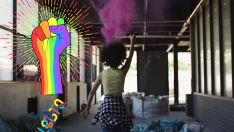 Animation-of-rainbow-fist-over-african-american-woman-with-flare
