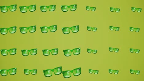 Animation-of-moving-glasses-over-green-background