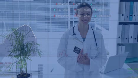 Animation-of-data-processing-over-smiling-caucasian-female-doctor-holding-documents