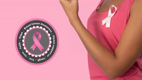 Animation-of-breast-cancer-awareness-text-over-smiling-african-american-woman-on-pink-background