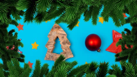 Animation-of-christmas-fir-tree-frame-over-decorations-on-blue-background