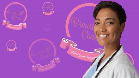 Animation-of-breast-cancer-awareness-text-over-smiling-african-american-female-doctor