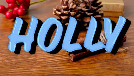 Animation-of-holly-christmas-text-over-decorations-on-wooden-background
