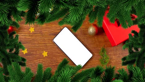 Animation-of-christmas-fir-tree-frame-over-smartphone-with-copy-space-on-wooden-background