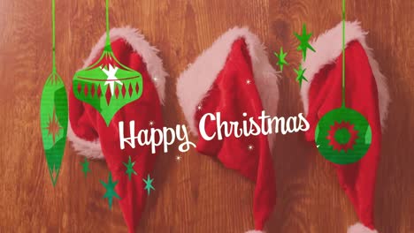 Animation-of-happy-christmas-and-decorations-over-wooden-background-with-santa-hats