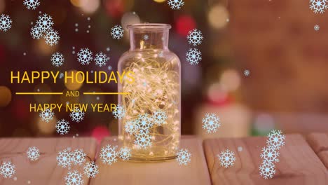 Animation-of-happy-holidays-and-happy-new-year-christmas-text-over-lights-in-jar
