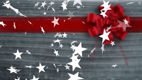 Animation-of-christmas-stars-falling-over-red-ribbon-in-background